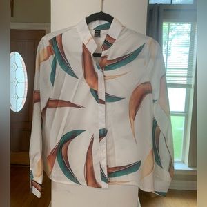 Shirt size S never worn. Good for any occasion!